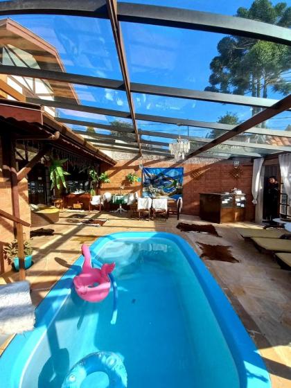 Suítes com frigobar-Tv- Área de lazer completa com Piscina- Sinuca-Copa-Academia-Lareiraa hidromassagem custo adc - image 22