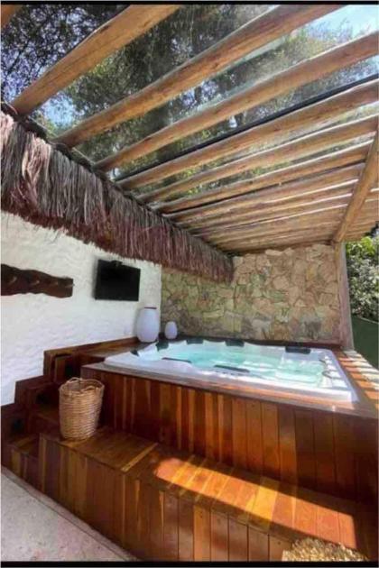 Chalét-Casa e Bangalo- Villa-Jacuzzi-Sauna-Lareira-Privativo - image 26