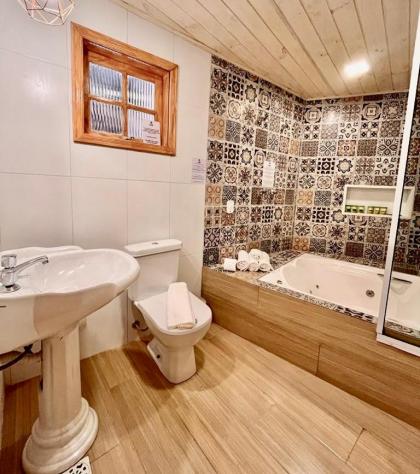 Pousada Bliss House - Opções de suites com hidromassagem - image 23