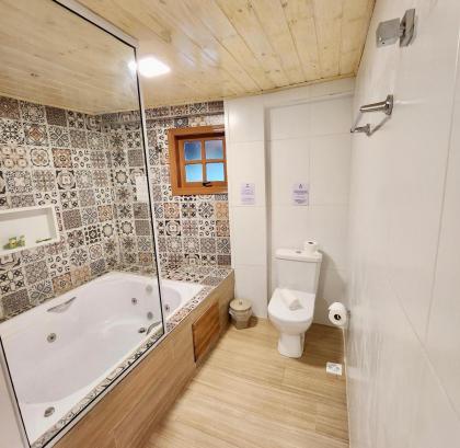 Pousada Bliss House - Opções de suites com hidromassagem - image 29