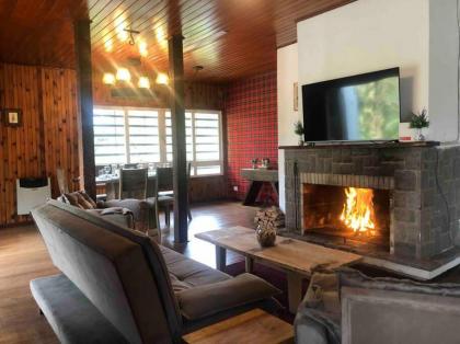 Lindo chalé em meio a natureza ao lado do centro - image 30